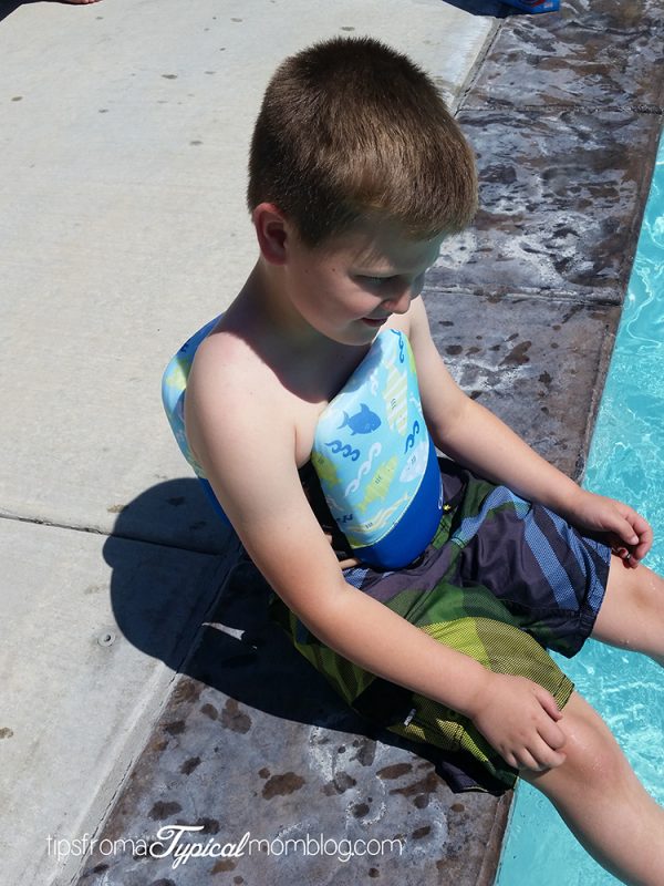 How do I teach my child to swim